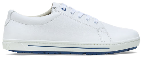 A minimalist, low-top white leather sneaker with white laces, a white midsole featuring a thin horizontal blue stripe, and a blue rubber outsole.
