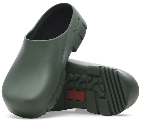 Olive green slip-on clog with lug sole.