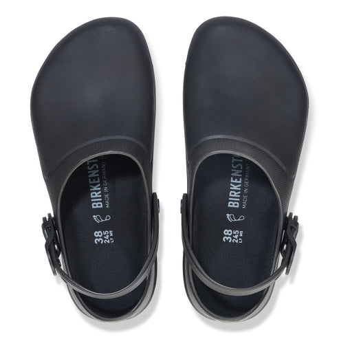 Pair of matte black clogs with adjustable heel straps and the label "BIRKENSTOCK MADE IN GERMANY" visible.