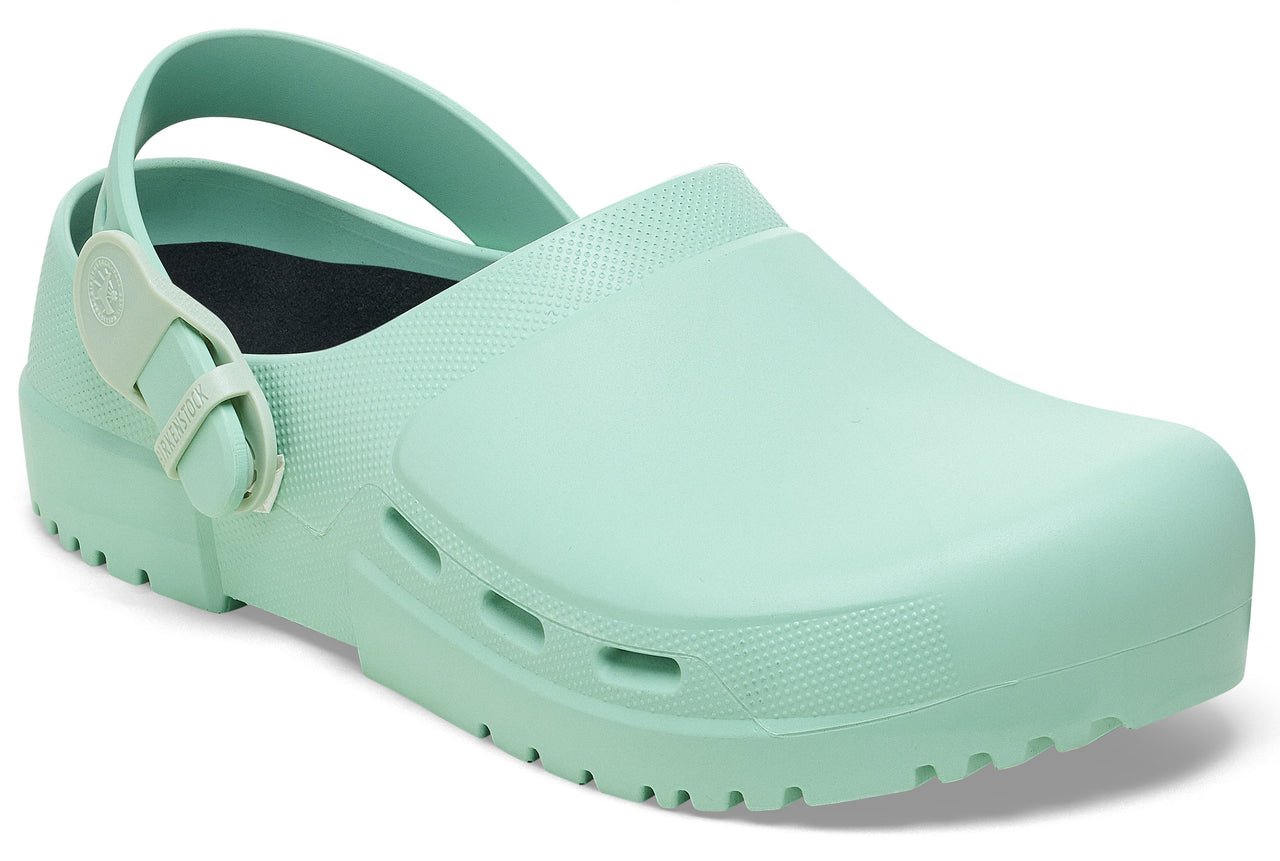 Mint green slip-on clog with adjustable back strap and side vents