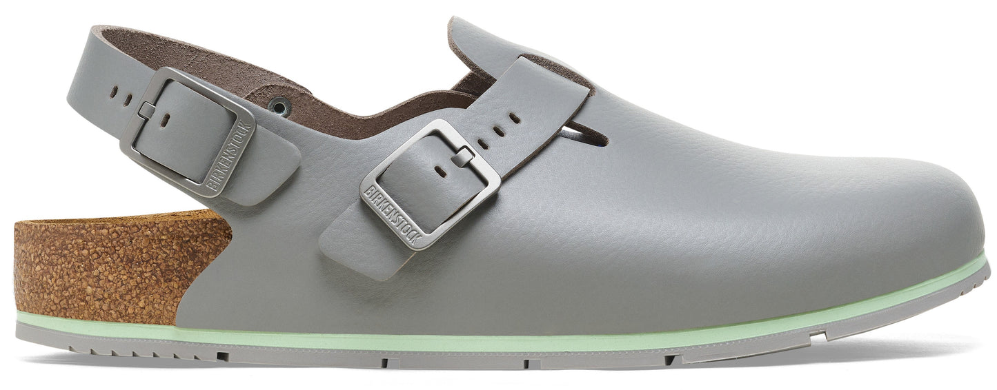 A gray closed-toe slip-on sandal with a cork heel bed and a light green trim along the sole, featuring two adjustable buckle straps over the instep and heel.
