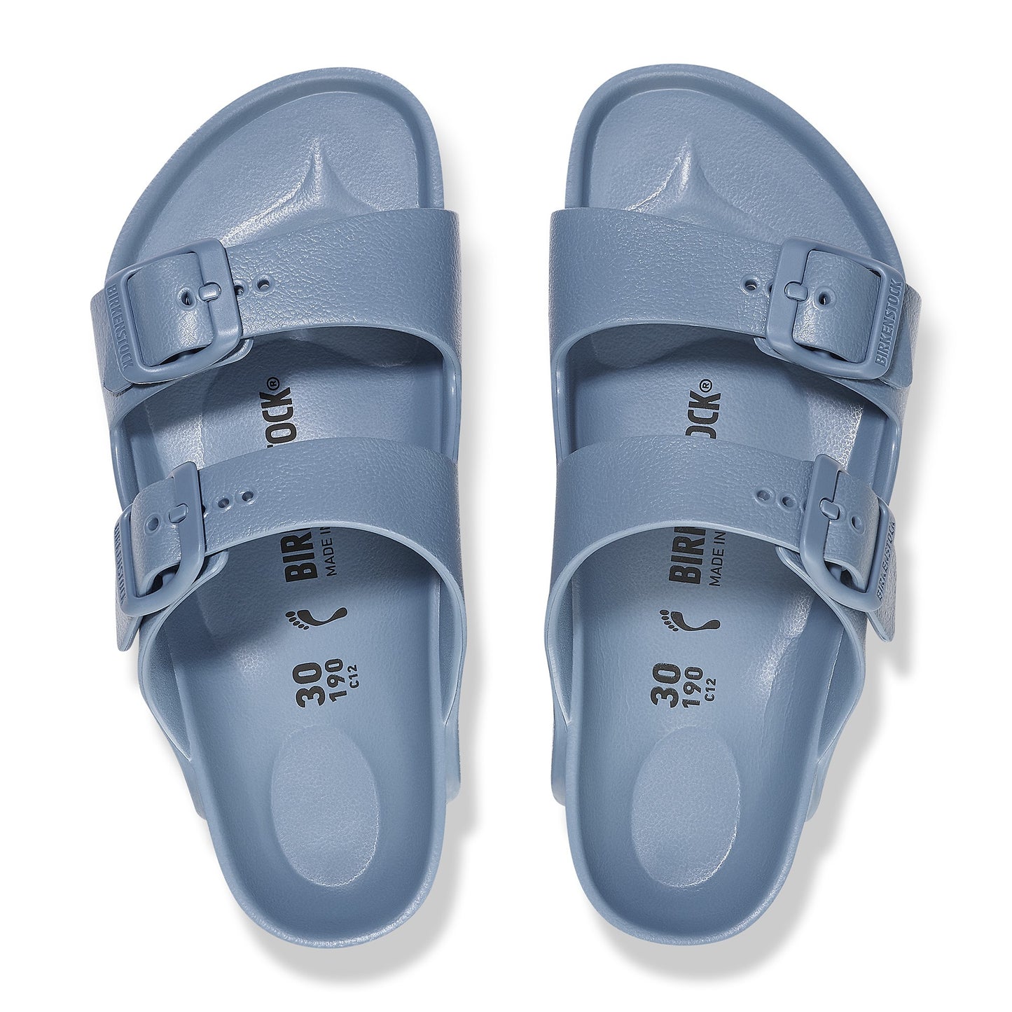 Pair of two-strap blue sandals with buckles.