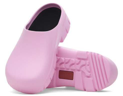Pair of pink, lug-soled, backless, unisex clogs