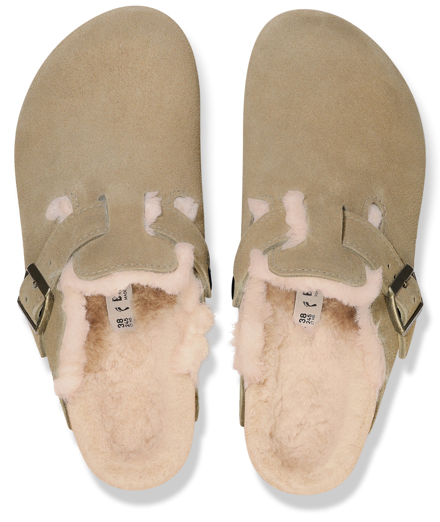 A pair of olive green suede slip-on clogs with a shearling lining and buckle strap detail, viewed from directly above.