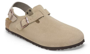 Beige suede clog with an adjustable top strap and a heel strap; it has a cork midsole and a dark brown outsole.