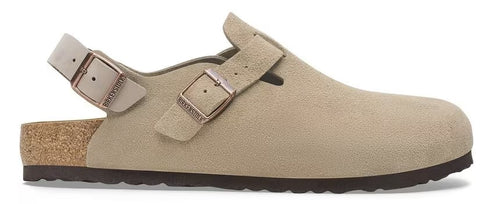 Beige clog-style shoe with adjustable strap and buckle.
