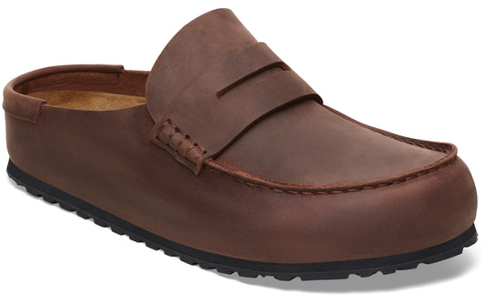 A brown leather slip-on mule with a penny loafer strap detail and a black textured rubber outsole.