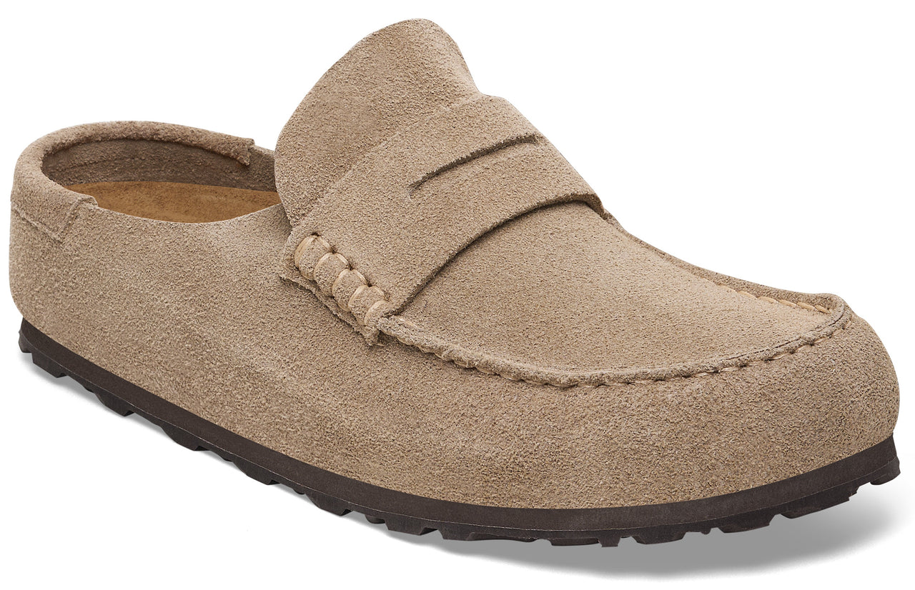 A light brown suede slip-on loafer with a penny strap and a thick, dark brown rubber sole.