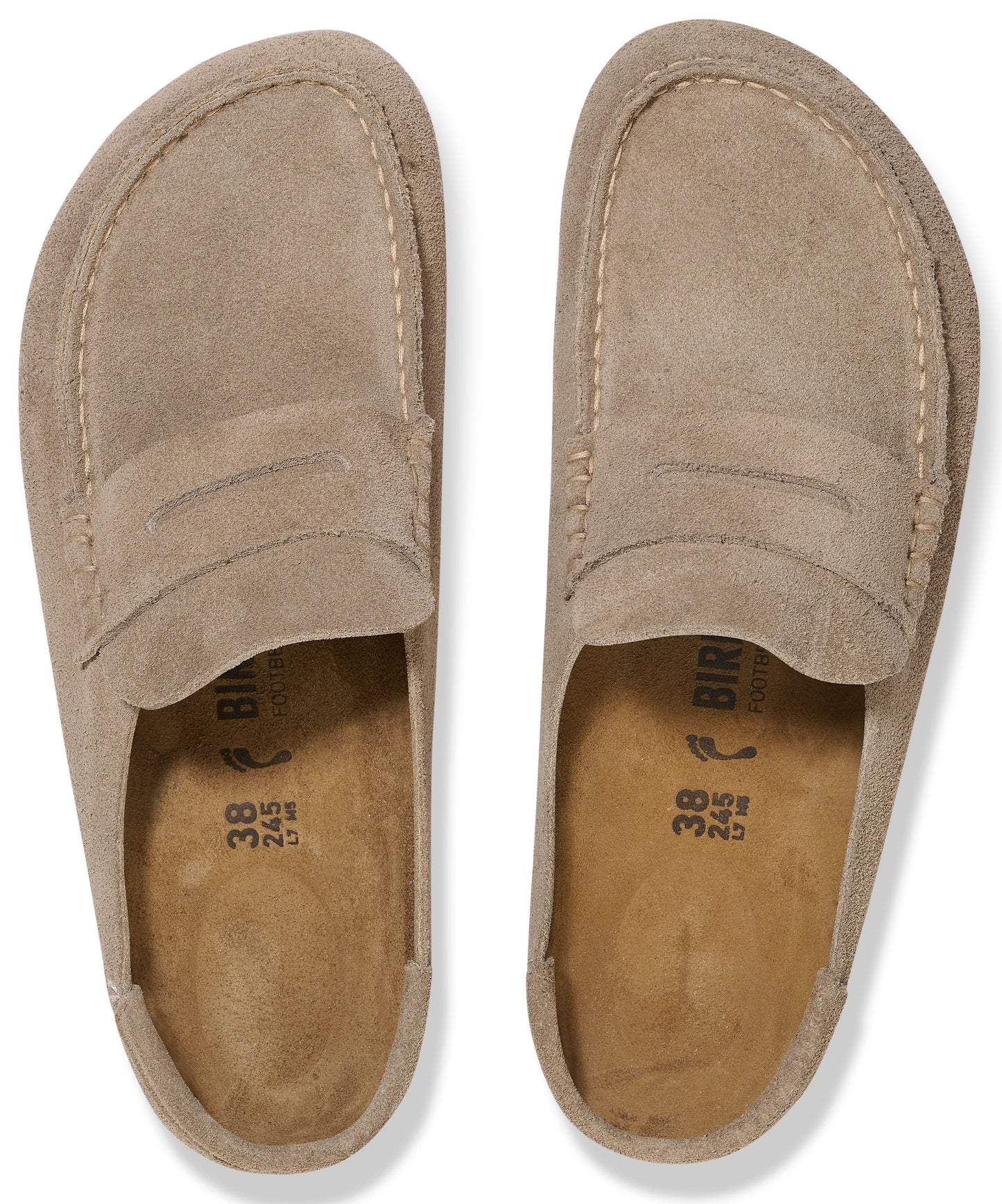A pair of taupe suede slip-on loafers shown from a top-down view, featuring rounded toes, visible stitching details along the vamp, and an open-back design with light brown footbeds showing embossed text that includes the size 38.