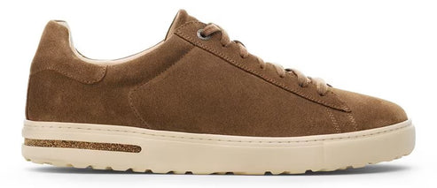 A brown suede sneaker with a white sole.