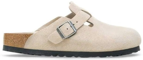 A buckled clog shoe.