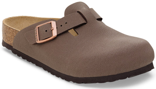 A brown slip-on clog shoe with a cork footbed and an adjustable strap across the top secured with a copper-colored metal buckle.