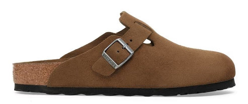 Brown buckled clog with cork footbed and black sole.