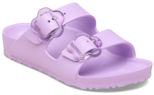 Lavender slide sandals with two straps, each with a flower-shaped buckle.