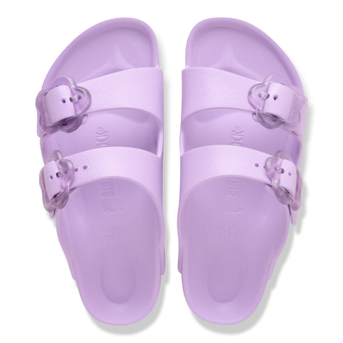 Two purple slide sandals with adjustable straps and translucent buckles.