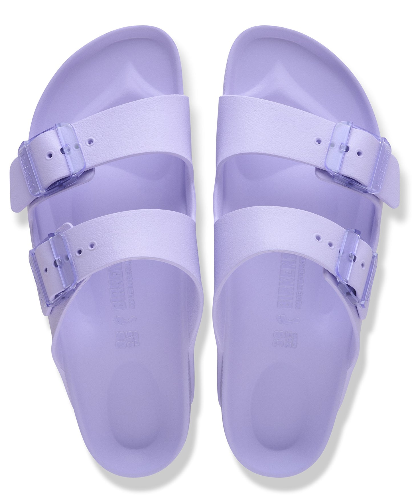 Pair of lavender plastic two-strap sandals with adjustable buckles, top view.