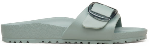 A slip-on sandal, light green, with an adjustable upper strap and silver buckle.