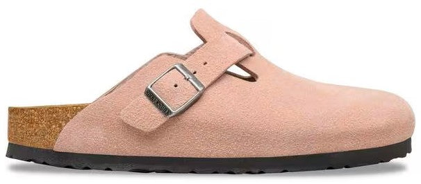 A pink clog with an adjustable silver buckle.