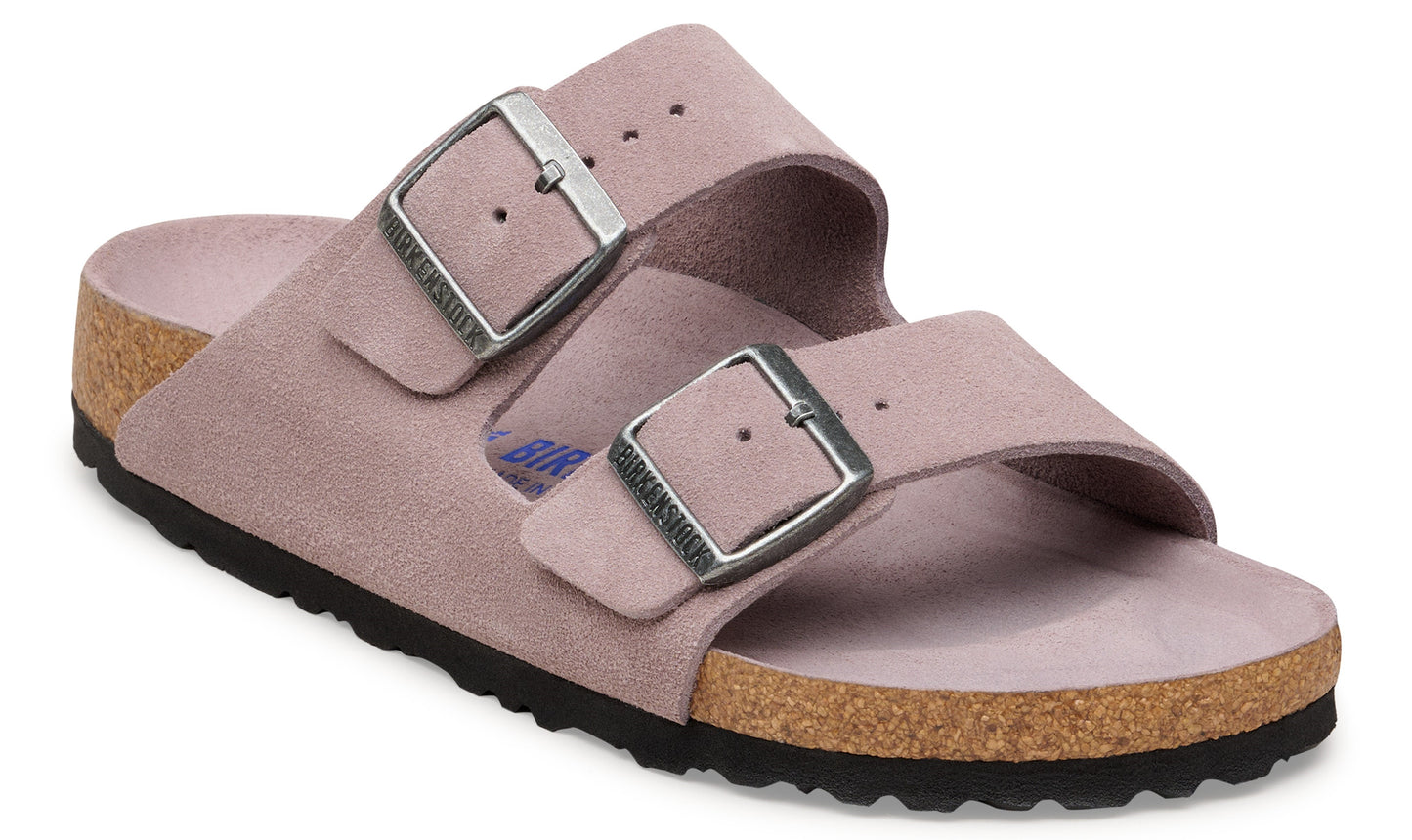 Suede sandal with two adjustable straps and silver buckles.