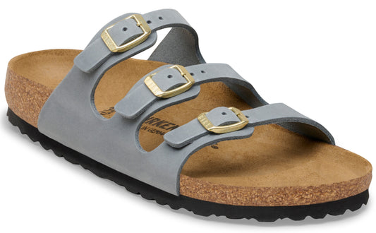 Slide sandal with three straps and gold buckles.