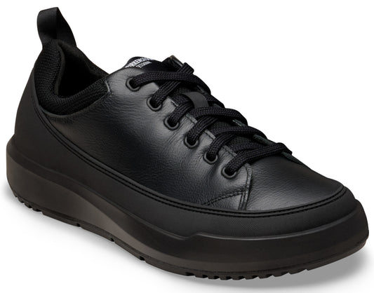 A black leather low-top sneaker featuring a thick platform sole, black laces, a padded collar, and a pull tab at the heel.
