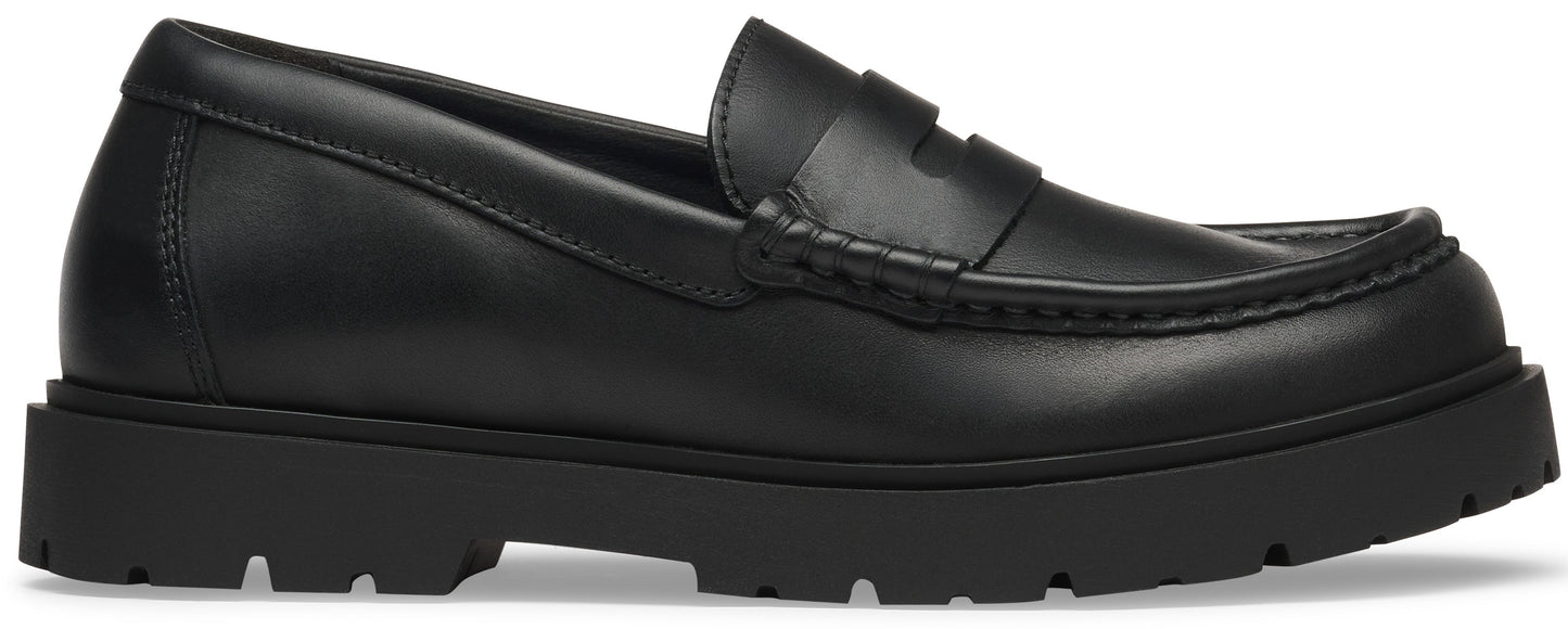 A black leather penny loafer with a chunky lug sole.