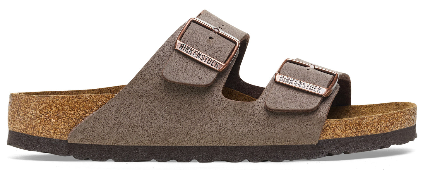 A pair of gray, two-strap sandals with cork soles.