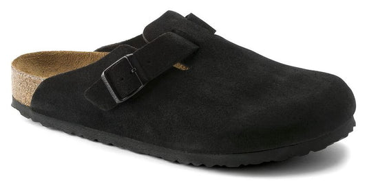 A black clog with an adjustable strap and buckle.