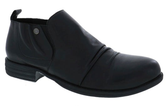 Black leather ankle boot with low heel and elastic side.
