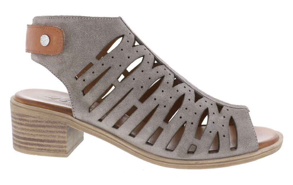 Open-toe, low-heeled gray sandal with side cutouts and an ankle strap.