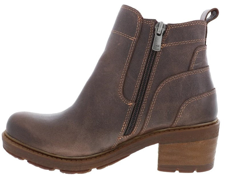 A brown leather ankle boot with a side zipper, visible top stitching, a pull tab at the heel, and a stacked block heel with a lugged rubber sole.