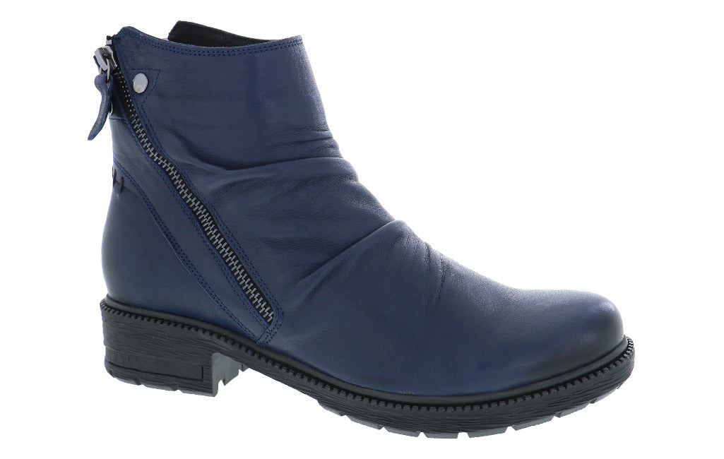 A navy blue ankle boot with a side zipper and low stacked heel.