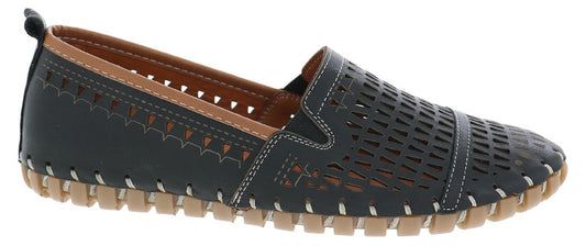 A black slip-on shoe with a tan sole and interior, featuring decorative perforations and stitching.