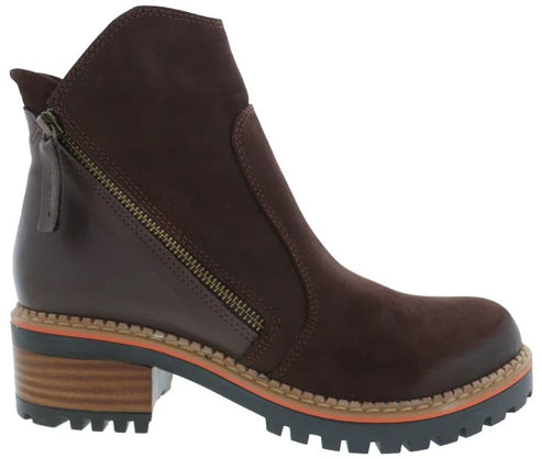 A dark brown suede ankle boot with a side zipper, a lug sole, and a stacked block heel featuring an orange trim detail.