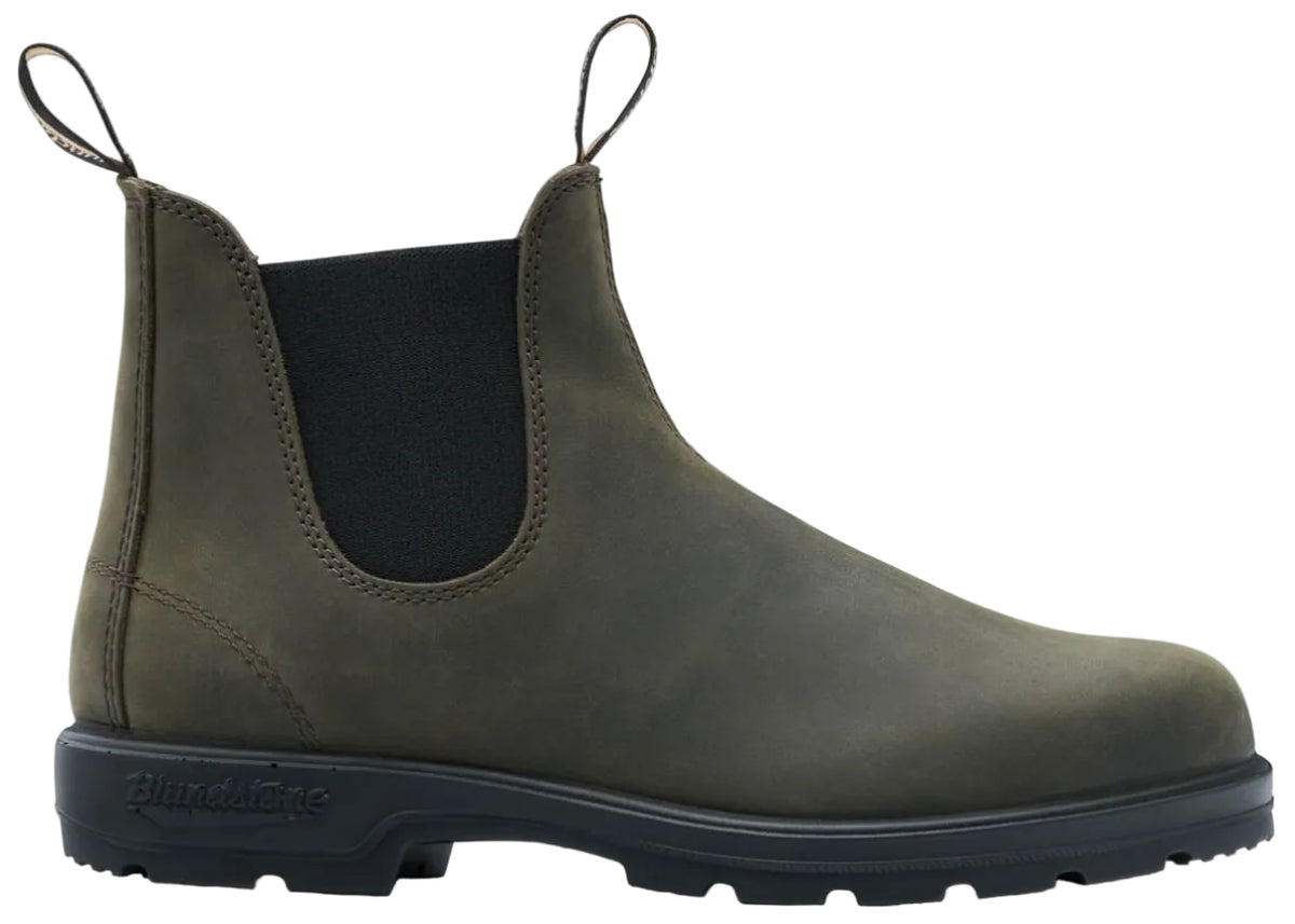 An olive green leather Chelsea boot with black elastic side panels, black rubber lug sole, and two black pull tabs.