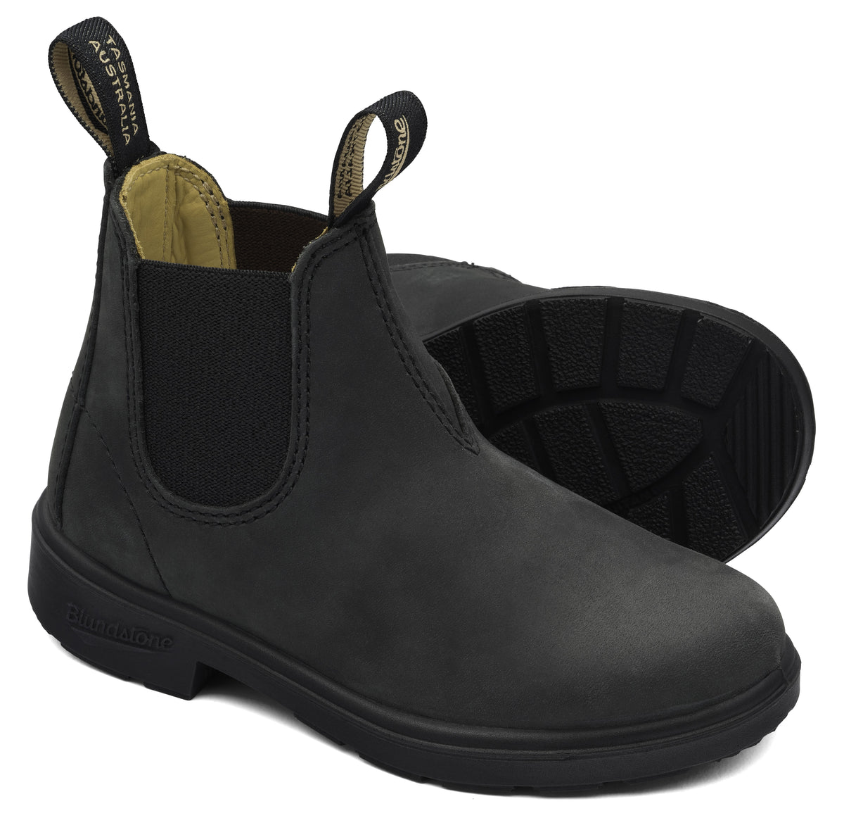 A black leather slip-on ankle boot with elastic side panels and two fabric pull tabs at the top, one showing the text 'TASMANIA AUSTRALIA', resting on a black sole with a lugged tread pattern.