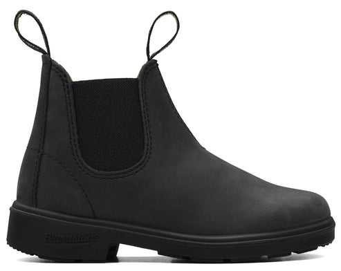 A black matte leather Chelsea boot featuring two fabric pull loops at the collar, an elastic side panel, and a thick, textured black rubber sole with the word Blundstone embossed on the heel.