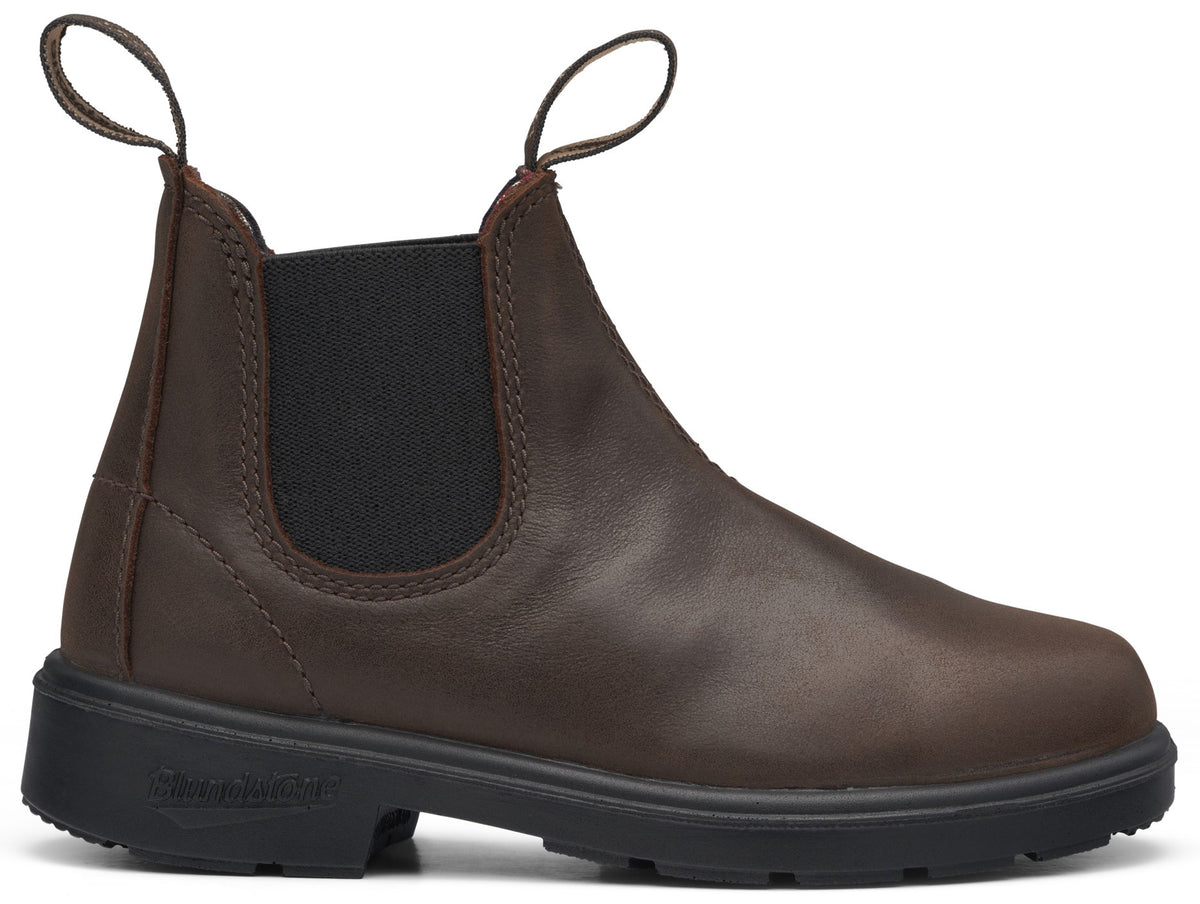 A brown leather Chelsea boot with black elastic side panels, black pull tabs on the front and back, and a thick black treaded sole.