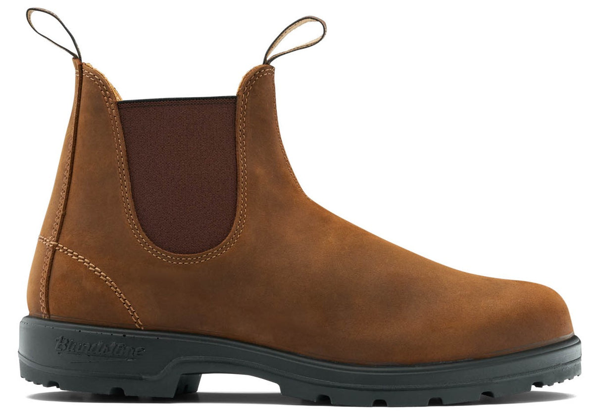 Brown leather Chelsea boot with black sole and elastic side panel.