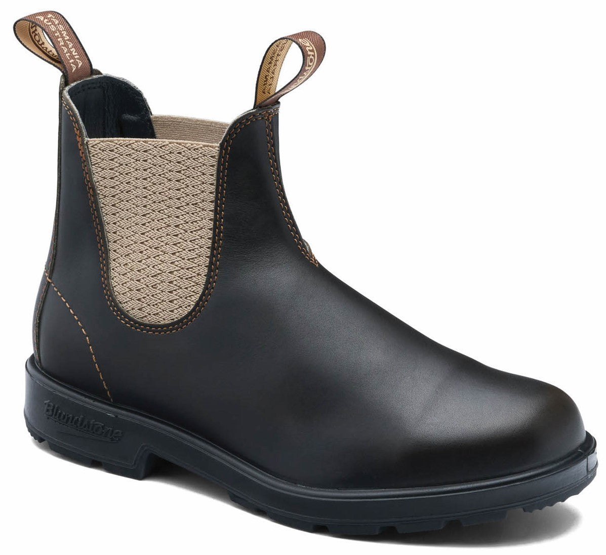 A dark brown leather Chelsea boot with tan elastic side panels and two brown fabric pull tabs on the collar, featuring brown contrast stitching and a thick black rubber lug sole, with 'Tasmania Australia' visible on the pull tab and the brand name embossed on the heel of the sole.