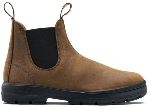 A brown leather Chelsea boot with dual pull tabs, black elastic side panels, and a thick, textured black rubber sole.