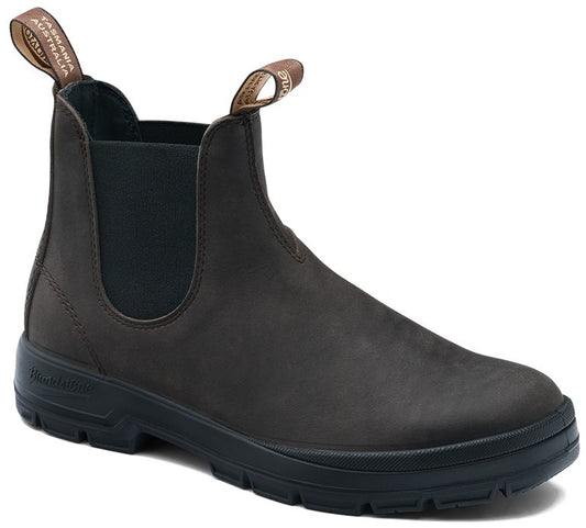 A dark brown leather Chelsea boot with elastic side panels, two pull-tabs, and a black lugged rubber sole, with "TASMANIA AUSTRALIA" visible on the back pull-tab.