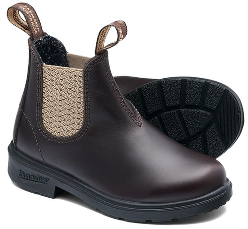 A brown leather Blundstone Chelsea boot with a tan elastic side panel and two pull tabs at the top, showing the black rubber lug sole underneath.