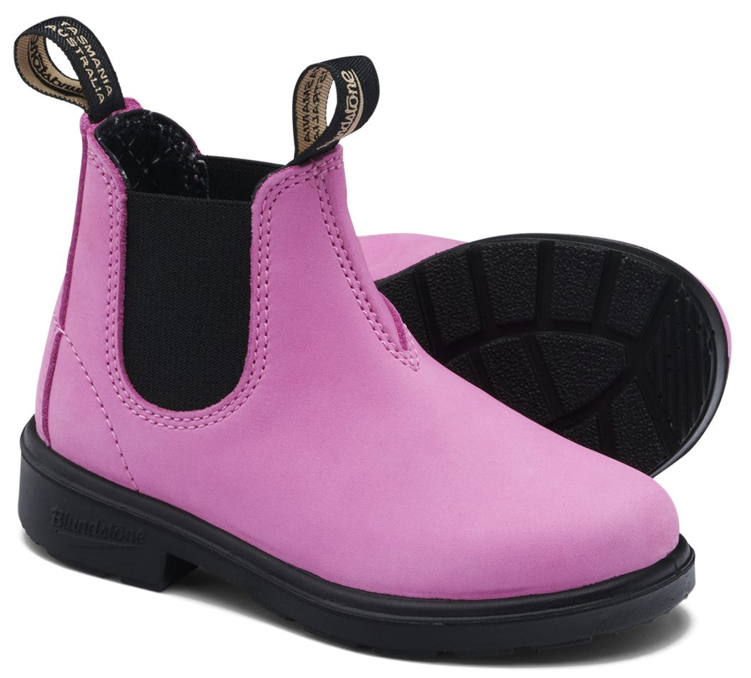 A pink leather Chelsea boot with a black elastic side panel, black rubber sole, and two black pull tabs at the collar with the text "TASMANIA AUSTRALIA" and "Blundstone" visible.