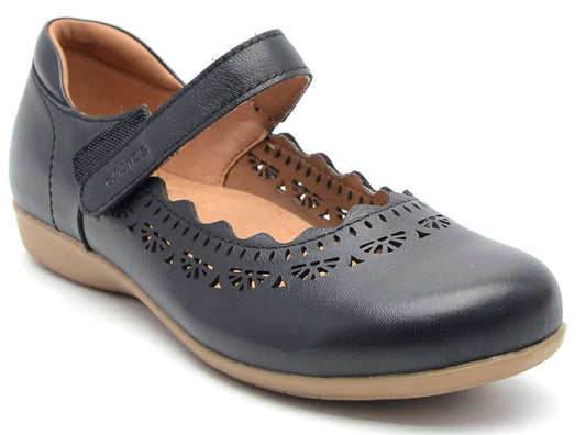 Black mary jane shoe with floral cutouts, strap, and tan sole.