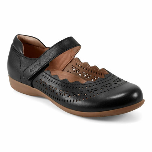 Black Mary Jane style leather shoe with scalloped and laser-cut decorative details and ankle strap.