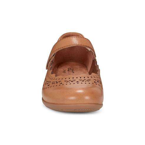 Tan Mary Jane shoe with laser cut outs and velcro strap.