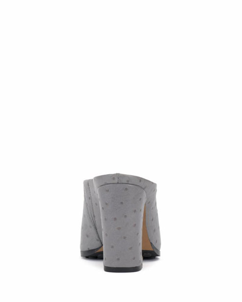 Gray heeled mule with textured design.