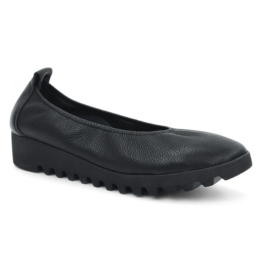 A black ballet-style shoe with a thick, ridged sole.