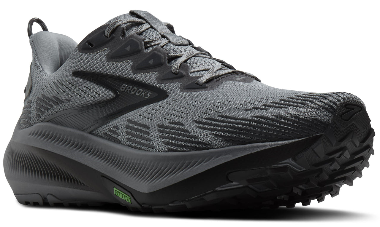 Gray running shoe with a black logo and sole.